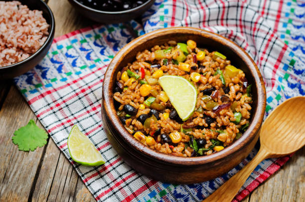 istock Black beans pepper cilantro zucchini  lime brown rice 1160445309