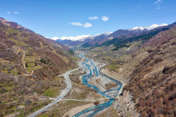 istock Mountain River and Road, taken in April 2019 1160446379