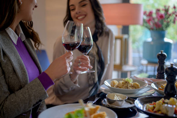 istock Colleagues toasting with red wine 1160447284