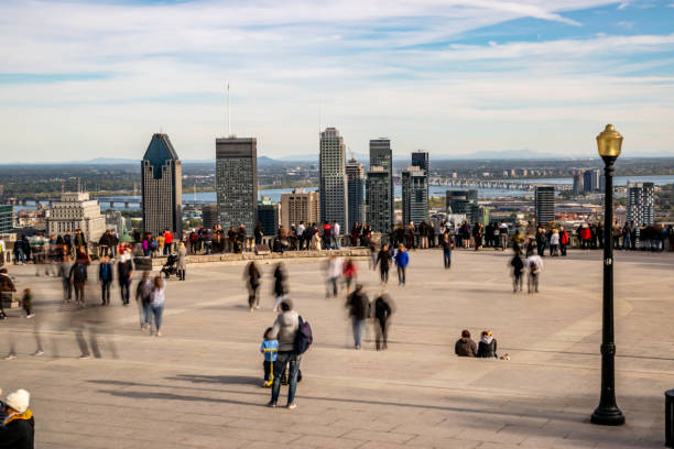 istock People looking at Montreal cityscape in autumn. 1160450967