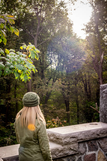 Woman in Mount Royal park during autumn.