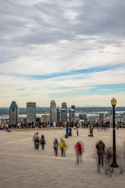istock People looking at Montreal cityscape in autumn. 1160451006