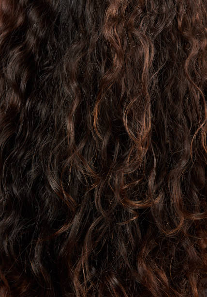 istock Brown natural woman hair 1160453073