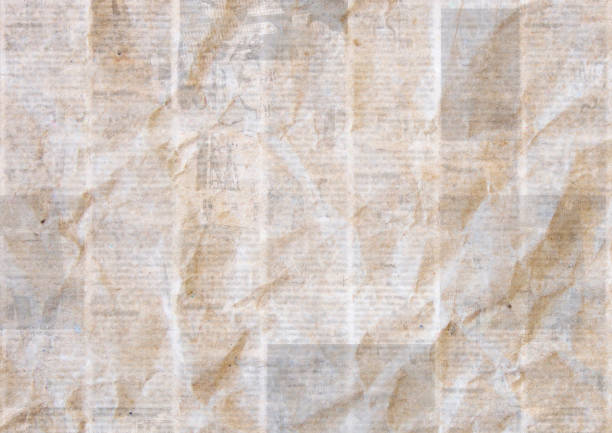 istock Vintage grunge newspaper paper texture background. Blurred old crumpled newspapers backdrop 1160453368