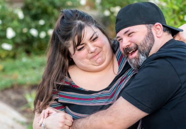istock Overweight multiethnic couple having fun 1160454845