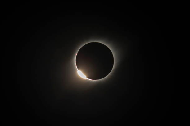 istock The Baily's beads effect and Diamond Ring effect during Total Solar Eclipse Chile 2019, amazing view of the Sun covered by the Moon during totality phase while the last sunbeams pass the Moon craters 1160469088