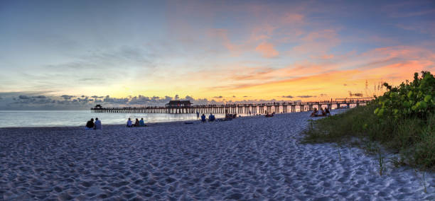 istock Sunset at the Naples Pier on Naples Beach 1160478221