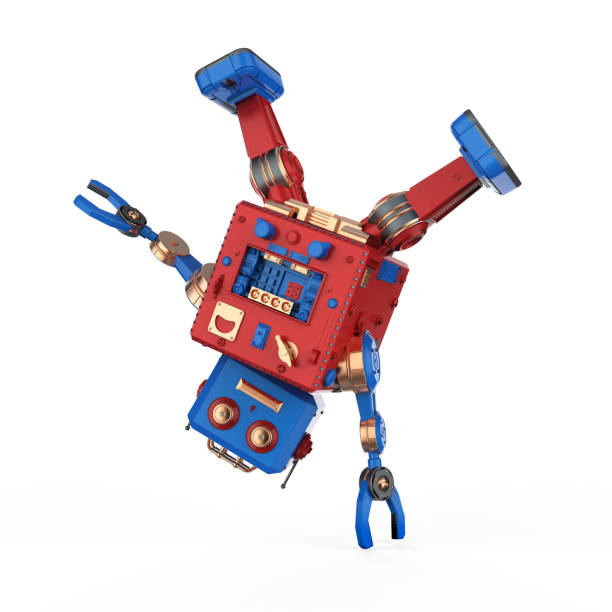ロボットスズおもちゃブレイクダンス - robot conformity toy retro revival ストックフォトと画像