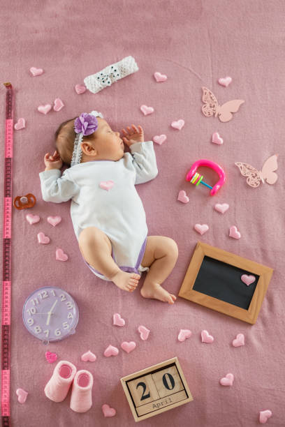 istock Adorable baby girl sleeping 1160478951