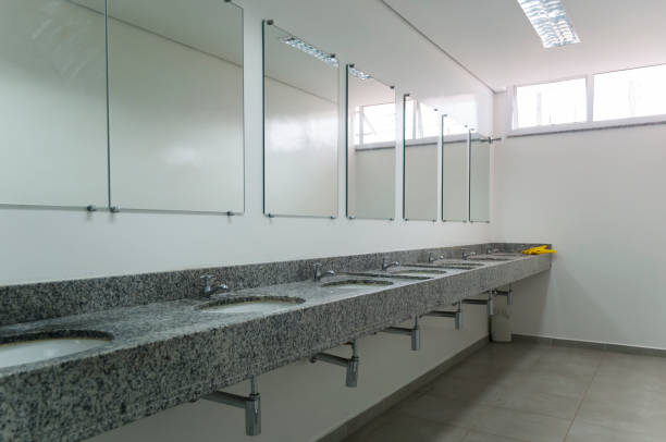 istock Interior of a restroom with mirrors. 1160482586