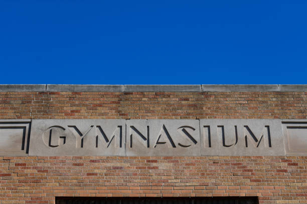 istock Old Gymnasium Sign on a School Building 1160494794