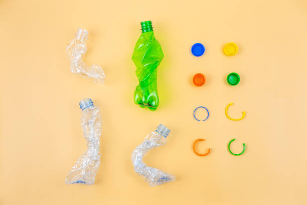istock Crumpled plastic bottles and caps ready for recycling. 1160503479