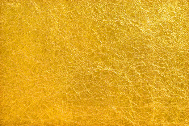 istock Shiny yellow leaf gold foil texture background 1160507059