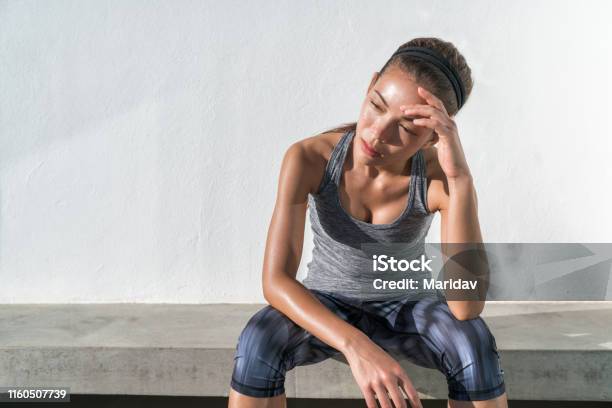 Tired Fitness Running Woman Sweating Exhausted Stock Photo - Download Image Now - Exercising, Sport, Women