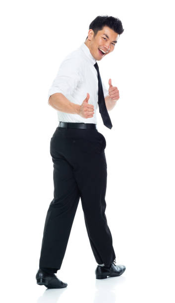 istock Handsome Asian Businessman - rear view walking and doing thumbs up 1160509024