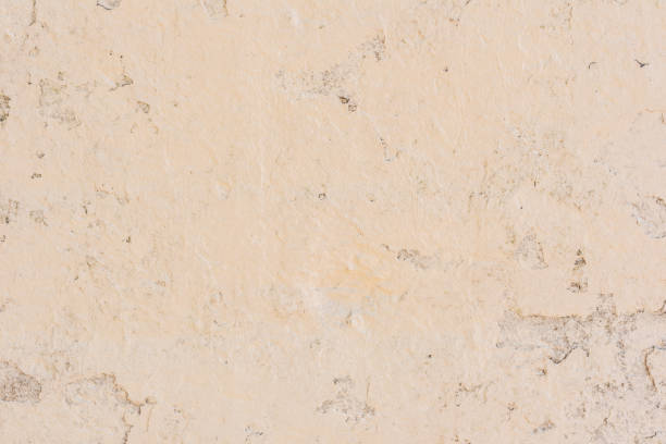 istock Texture of a concrete wall with cracks and scratches which can be used as a background 1160509197