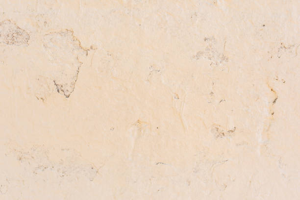 istock Texture of a concrete wall with cracks and scratches which can be used as a background 1160509211