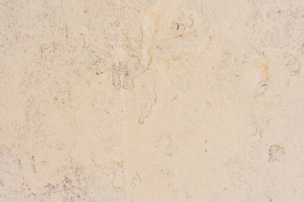 istock Texture of a concrete wall with cracks and scratches which can be used as a background 1160509212