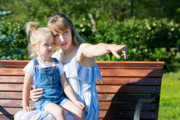 istock Mom put her daughter in her lap. 1160510178