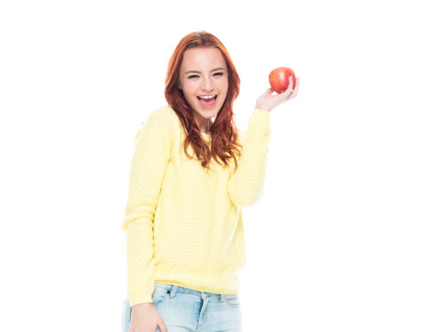 istock Female holding an apple 1160513360