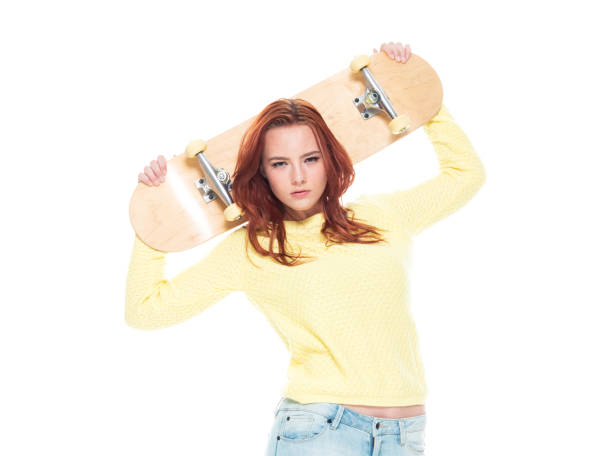 istock Cute female holding a skateboard 1160514620