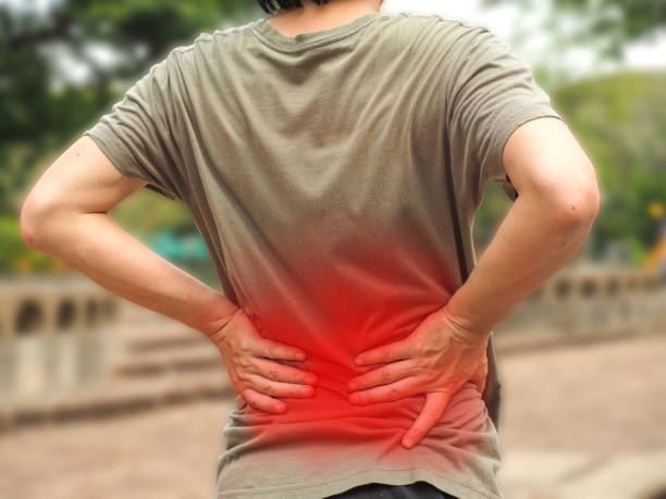 istock A men Unhappy suffering from backache , healthy concept. 1160515707
