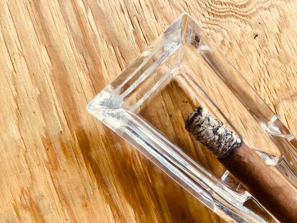 istock close up handmade cigar with long ashes 1160516484