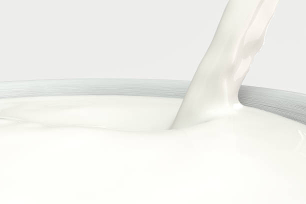 istock A bowl of milk and splashing liquid, 3d rendering. 1160517734
