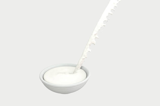 istock A bowl of milk and splashing liquid, 3d rendering. 1160517738
