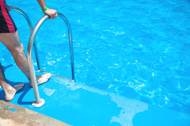 istock Caucasian man in the swimming pool. 1160520527
