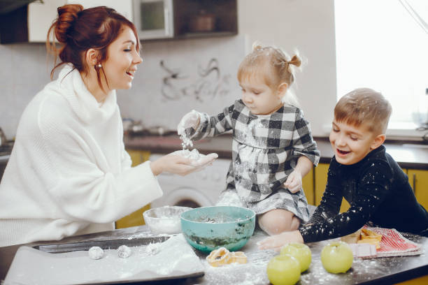 istock Cute family prepare the breakfest in a kitchen 1160521674