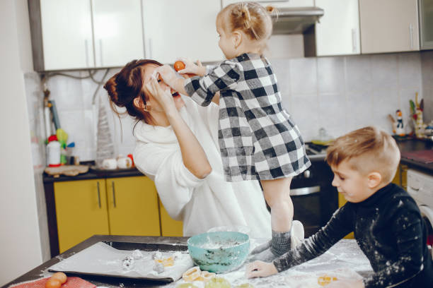 istock Cute family prepare the breakfest in a kitchen 1160521915