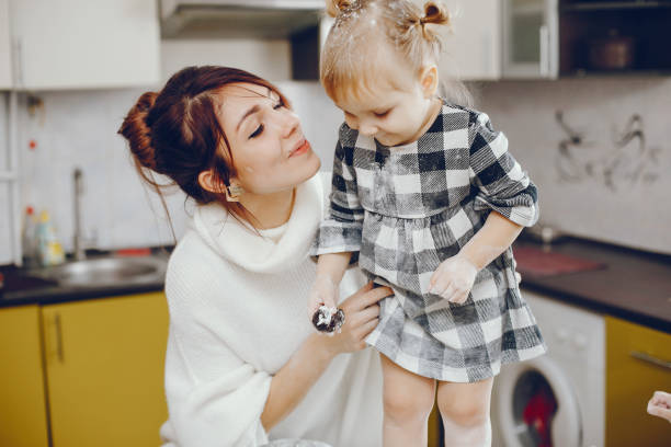 istock Cute family prepare the breakfest in a kitchen 1160521944