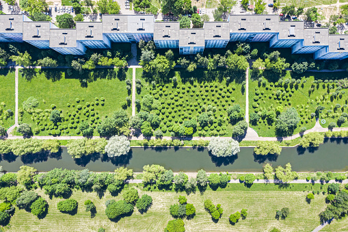 panoramic aerial view of apartment building complex. recreation area with water canal and green trees.  Minsk, Belarus