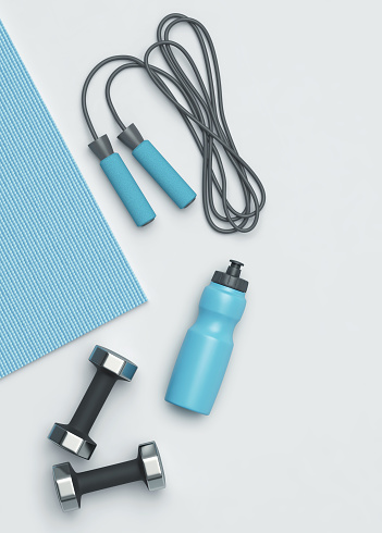 Fitness background. Fitness mat, dumbbells, jumping rope and a bottle of water on the floor. 3D rendering