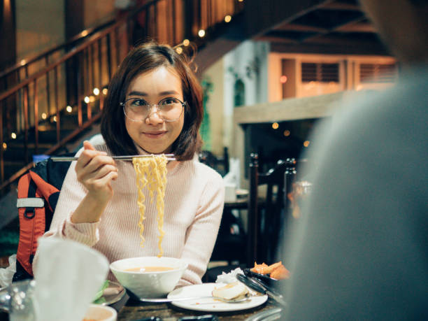 istock Asian tourist enjoying in Korea restaurant. 1160526975