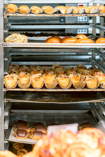 istock The process of baking rolls. Roast with buns and pastries. Bakery 1160530500