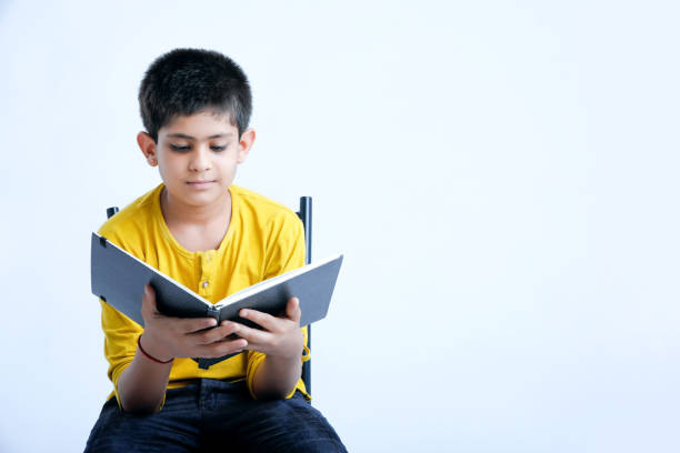 istock young cute indian child standing over white background 1160532055