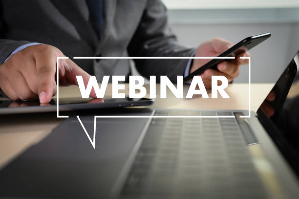 istock WEBINAR man hand on table Business, coffee, Split tone WEBINAR phone 1160533071