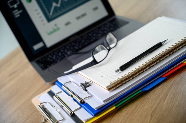 istock Businessman working reading documents graph financial to job succes Analyze document plans 1160533115