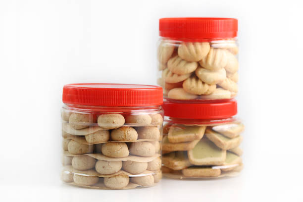 Chinese new year cookie in a plastic containers isolated on white background