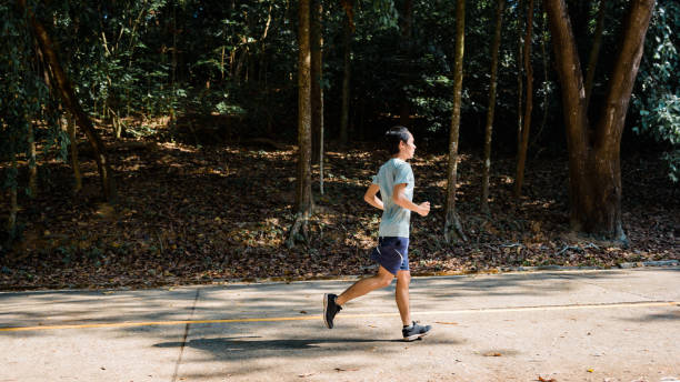 istock young man runner athlete running  in a park 1160537659