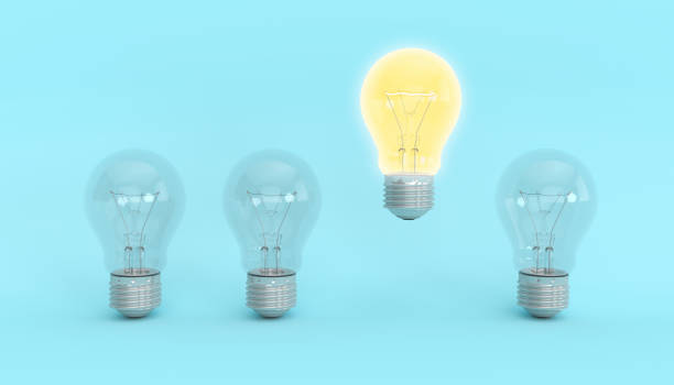istock burning yellow light next to the lights off 1160538911