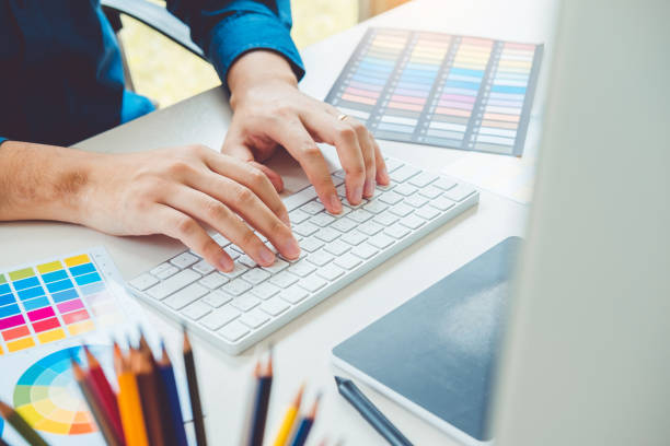istock Graphic designer drawing on graphics tablet at workplace 1160539765
