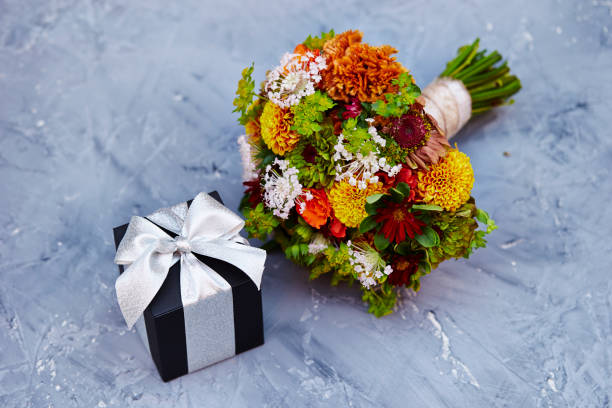 istock Flower bouquet with gift box 1160539907