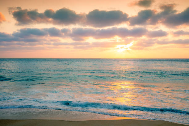 istock Sunset over the sea. Atlantic ocean in evening, sandy beach 1160540010