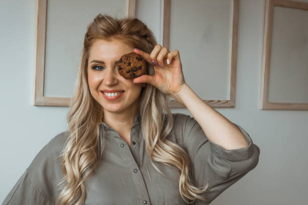 istock Girl with oatmeal cookies 1160542802