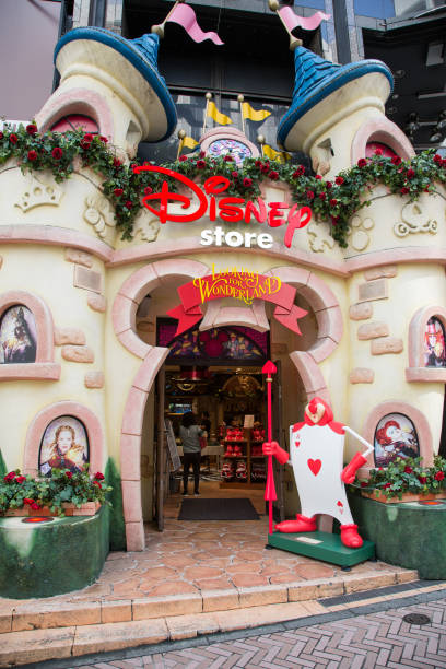 Tokyo, Japan - 21 June 2016: The Alice in Wonderland entrance to the Takashimaya Shinjuku Disney Store in Tokyo. The doorway is like a fairytale castle with a Mickey Mouse shaped entrance.