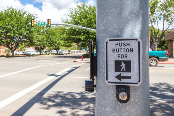 push button for crosswalk sign on a road in the USA