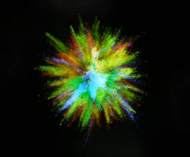istock Explosion of colored powder on black background 1160546818